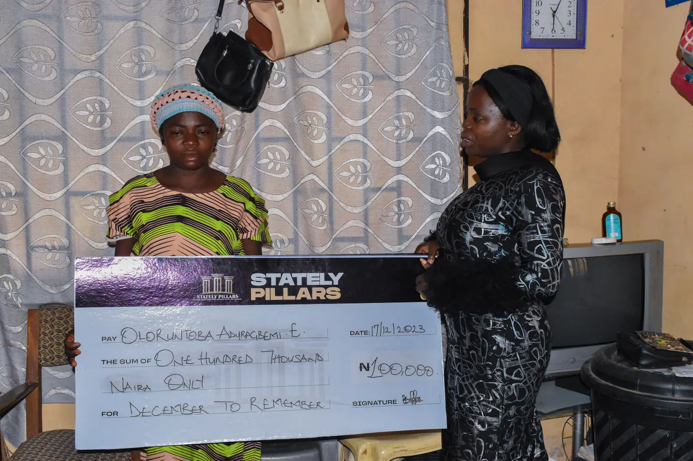 A widow receiving her empowerment cheque